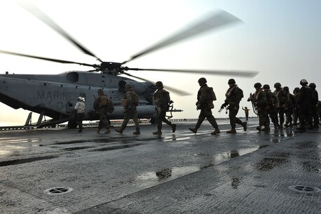 Marines board a CH-53E Super Stallion helicopter, assigned to Marine Medium Helicopter Squadron (HMM) 262, 31st Marine Expeditionary Unit aboard the forward-deployed amphibious assault ship USS Bonhomme Richard (LHD 6)to be transported ashore for exercise Cobra Gold 2013 here, Feb. 13. Cobra Gold is an annual exercise that includes numerous multilateral events ranging from amphibious assaults to non-combatant evacuation operations. The training aims to improve interoperability between the United States, the Kingdom of Thailand, and many other participating countries. The 31st MEU is the only continuously forward-deployed MEU and is the Marine Corps’ force in readiness in the Asia-Pacific region.
