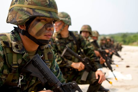 Royal Thai Marines assemble on line after coming ashore during a bilateral boat raid as a part of exercise Cobra Gold 2013 here, Feb. 15. Cobra Gold is an annual exercise that includes numerous multilateral events ranging from amphibious assaults to non-combatant evacuation operations. The training aims to improve interoperability between the United States, the Kingdom of Thailand, and many other participating countries. The 31st Marine Expeditionary Unit is the only continuously forward-deployed MEU and is the Marine Corps’ force in readiness in the Asia-Pacific region.