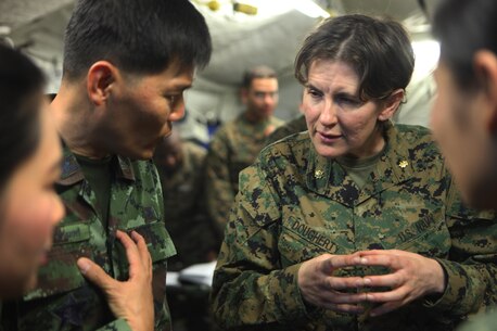 Lt. Cmdr. Angela Dougherty, critical care clinical nurse specialist with 3rd Medical Battalion, III Marine Expeditionary Force, explains the capabilities of the 31st Marine Expeditionary Unit's forward resuscitative surgical suite to a group of Royal Thai Army medical personnel here, Feb. 16. The RTA medical visit helps the U.S. medical staff understand how to treat any incoming Thai personnel during exercise Cobra Gold 2013. Cobra Gold, in its 32nd iteration, is a multinational exercise that promotes regional prosperity, security and cooperation among partner militaries.
