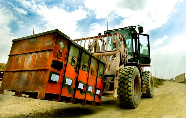 A 455th Expeditionary Maintenance Squadron precision-guided munitions crew chief, transports ammo into a storage yard at Bagram Airfield, Afghanistan, June 13, 2013. The 455th EMXS ammo flight is responsible of maintaining ammo storage facilities and accountability of all ammo here. (U.S. Air Force photo/ Staff Sgt. Stephenie Wade)