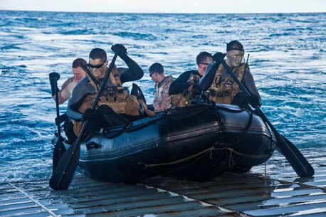 Marines of the Amphibious Reconnaissance Platoon of the 31st Marine Expeditionary Unit push a combat rubber raiding craft into the ocean from the well deck ramp here, July 17. The platoon used the CRRC boats to insert multiple reconnaissance teams in support of an upcoming amphibious raid as part of exercise Talisman Saber 2013. The Marines and Sailors of the 31st MEU, PHIBRON 11, and Expeditionary Strike Group 7 are training alongside a joint U.S. force that totals approximately 18,000 personnel, as well as approximately 9,000 Australian service members in the fifth iteration of Talisman Saber, a month-long biennial exercise designed to enhance multilateral collaboration in support of future combined operations, natural disaster, humanitarian and emergency response. The 31st MEU is the Marine Corps’ force in readiness for the Asia Pacific region and the only continuously forward-deployed MEU. 