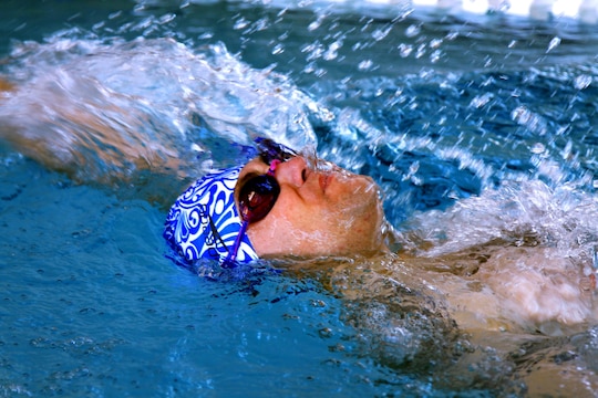 Sgt. Matthew R. Bowen, a patient from Wounded Warrior Battalion East, swims during a wounded warrior swim camp here July 18. 