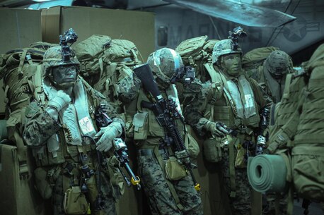 Marines with Company E., Battalion Landing Team 2nd Battalion, 4th Marines, 31st Marine Expeditionary Unit, wait to board aircraft for an aerial assault here, July 21. The Marines and Sailors of the 31st MEU and Amphibious Squadron 11 are part of an integrated force of approximately 18,000 U.S. service members training alongside approximately 9,000 Australian service members in the fifth iteration of Talisman Saber 2013, a month-long biennial exercise designed to enhance multilateral collaboration in support of future combined operations, natural disaster, humanitarian and emergency response. The 31st MEU is the Marine Corps’ force in readiness for the Asia Pacific region and the only continuously forward-deployed MEU. 