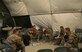 Chaplain (Capt.) Myung Cho and his assistant Staff Sgt. Frank Rivas, play the guitars and sing a song during a worship service with Airmen assigned to the 455th Expeditionary Security Forces Group at Bagram Air Field, Afghanistan, July 21. Cho visits the Airmen prior and during their shifts as much as he can to raise their morale and offer a variety of worship services. ( U.S. Air Force photo/ Staff Sgt. Stephenie Wade)