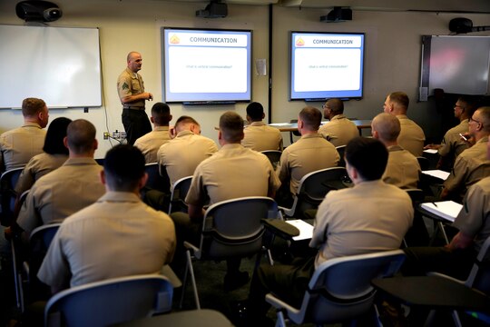 Sgt. Timothy Wilson teaches Marines important communication skills that will help them in the work place during the Lance Corporal Seminar held at the Marine Corps Air Station here July 24.  Wilson is the lead instructor for the seminar and is an operations chief for airfield operations at the air station. The Lance Corporal Seminar is a three-day course that the air station started this year to provide junior Marines with the knowledge and skills to progress in their military careers.  