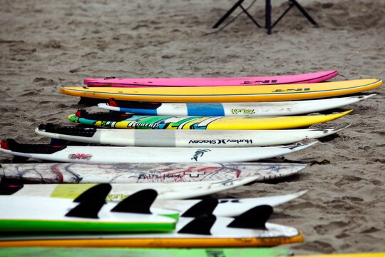 Surfboards lay out on Del Mar Beach for children to use during the Hurley surf event held at the Del Mar Beach Resort here June 2. Hurley’s summer surf tour travels around the country to let young kids learn from and ride with professional surfers.