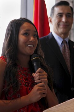 Karena Gonzalez, left, introduces herself at the annual Academy Breakfast with Congressman Darrell Issa at the Pacific Views Event Center here June 15. Gonzalez was one of seven high school graduates nominated to attend a U.S. military academy. Issa is the U.S. Representative for California's 49th congressional district.