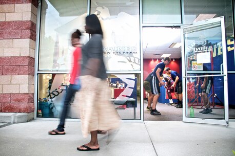 Future Marines with Recruiting Substation Naples, Recruiting Station Fort Lauderdale, Fla., warm up before starting an evening workout June 12, 2013. Recruiters train and mentor dozens of future Marines each week and demand a high standard of mental, moral and physical strength. 
