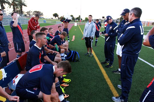 Team USA Armed Forces players sit on the bench as the coaches go over the first half of their game against Bethesda University held at the 11-area field here June 24.Team USA Armed Forces won 5-1 after 90 minutes of play. Team USA Armed Forces is scheduled to play in the 1st Annual Military World Cup held in Baku, Azerbaijan.
