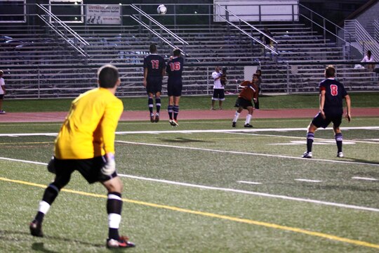 Defensive players from Team USA Armed Forces jump prepare to block a kick from a Bethesda player late in the second half of their game held at the 11-area field here June 24. Team USA Armed Forces won 5-1 after 90 minutes of play. Team USA Armed Forces is scheduled to play in the 1st Annual Military World Cup held in Baku, Azerbaijan.