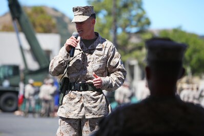 Lieutenant Col. Mark T. Donar, incoming commanding officer, 1st Maintenance Battalion, Combat Logistics Regiment 15, 1st Marine 
Logistics Group, gives a speech after taking command of the battalion aboard Camp Pendleton, Calif., June 27, 2013.
