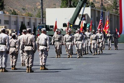 Marines with 1st Maintenance Battalion, Combat Logistics Regiment 15, 1st Marine Logistics Group, march on the parade deck during their battalion’s change of command ceremony aboard Camp Pendleton, Calif., June 27, 2013. During the ceremony, Lt. Col. Christian D. Richardson, the outgoing commanding officer, relinquished his command of the battalion to Lt. Col. Mark T. Donar.