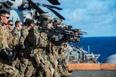 Marines of the Force Reconnaissance Platoon, 31st Marine Expeditionary Unit, conduct a small-arms, live-fire exercise on the port aircraft elevator here, June 29.  The 31st MEU is currently underway with Amphibious Squadron 11, beginning their summer patrol. The 31st MEU is the Marine Corps’ force in readiness for the Asia Pacific region and the only continuously forward-deployed MEU. 
