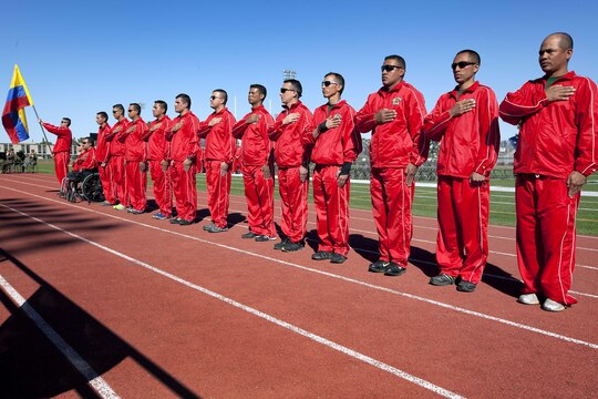 Participants from Colombia stand at the position of attention while their national anthem is played by the 1st Marine Division Band during the opening ceremony of the Marine Corps Trials here Feb. 28.

Wounded, ill and injured Marines are will be competing in the 2013 Marine Corps Trials here until March 6. 