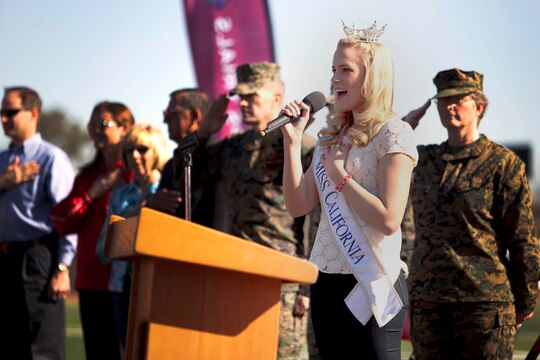 Leah Cecil, Miss California, sings the Star-Spangled Banner during the opening ceremony of the Marine Corps Trials here Feb. 28.

Wounded and ill Marines will be competing in the 2013 Marine Corps Trials here March 1-6. 
