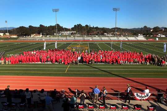 Athletes, staff and guests gather for a group photograph after the opening ceremony of the Marine Corps Trials here Feb. 28.

Wounded and ill Marines will be competing in the 2013 Marine Corps Trials here until March 6. 
