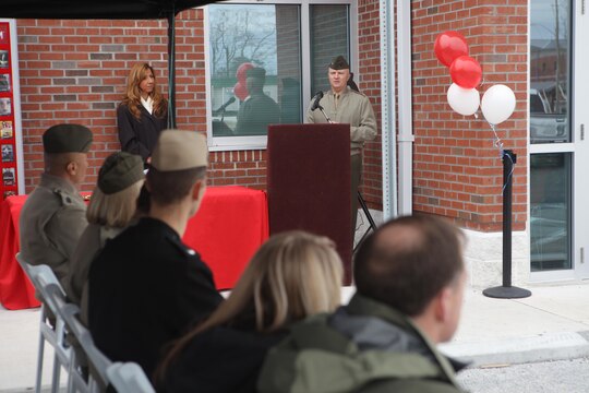 Col. Darrell Thacker, deputy commander of Marine Corps installations-East, gives thanks to those who attended the grand opening of the new Marine Corps Exchange facility aboard Stone Bay on Feb. 22. Thacker talked about the comparison between Stone Bay years ago and now.