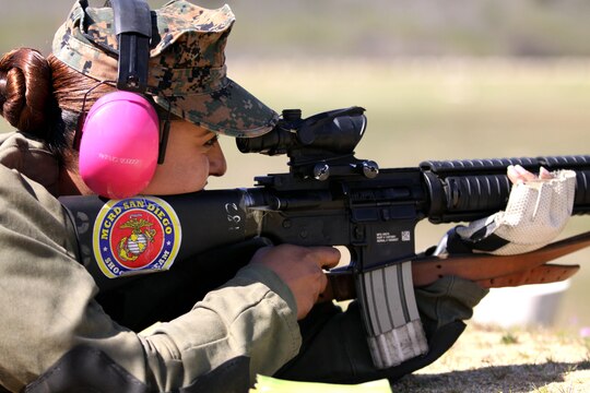 Cpl. Raquel Martinez fires an M16 A4 service rifle during the Western Division Matches at Wilcox Range here March 6. 

"I won first place for individual rifle," said Martinez, a range coach for Edson Range with Marine Corps Recruit Depot.
