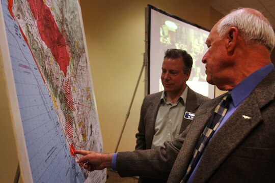 Larry Rannals identifies noteworthy land marks for Jay Petrek during a classat the Pacific Views Events Center here March 21. Rannals is the community plans and liaison officer here and Petrek is the principal planner for the City of Escondido and Leadership North County student. 