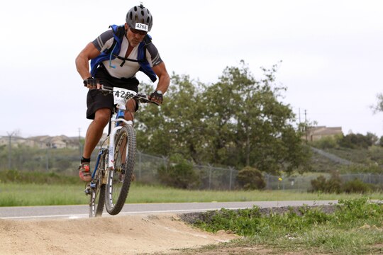 Brian Tasse enters the 13-mile off-road trail of the Hell Fire Fat Tire Bike Race here March 23. 
