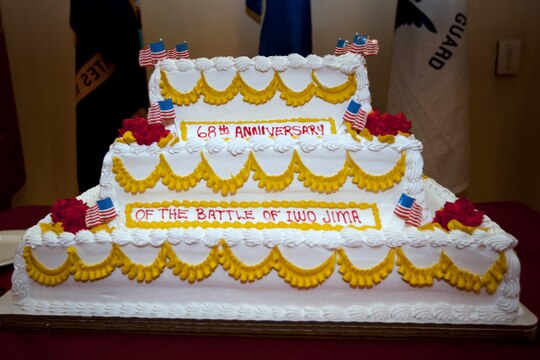 Hundreds gathered to honor those who served in World War II during the 68th annual Battle of Iwo Jima Commemoration ceremony held at the Pacific Views Event Center here March 23. The event featured a memorial service 21-Gun Salute, followed by the playing of “Echo Taps”. After the memorial service the ceremony continued with a reenactment of the historic flag-raising conducted by the United States Marine Corps Historical Company.