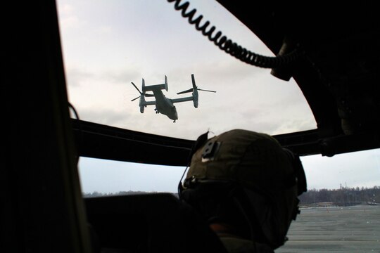 An MV-22B Osprey from VMM-161 takes flight en route to the USS Anchorage April 30.  VMM-161 is in Alaska to support the the USS Anchorage and be a static display on the ship during public tours before it's commissioning ceremony on May 4.  VMM-161 flew out to meet the ship before they pulled into port May1.