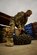 U.S. Air Force Staff Sgt. Ryton Hitzel, a vehicle maintenance technician assigned to the 466th Air Expeditionary Squadron, removes the tire from the rim of an all-terrain vehicle, March 11, 2013, in Tarin Kowt district, Uruzgan province, Afghanistan. Hitzel is a Coalition Force member attached to a forward operating base vehicle maintenance battalion where he repairs and maintains vehicles and other equipment. Coalition Force  Airmen are embedded with the Army at about 80 locations throughout Afghanistan to provide critical skill sets and dynamic leadership. Hitzel, a native of Rapid City, S.D., is deployed from Ellsworth Air Force Base, S.D. (U.S. Air Force photo by Staff Sgt. Marleah Miller)