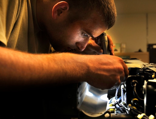 Senior Airman Garron Theriault, 455th Expeditionary Maintenance Squadron egress technician, uses a mirror to examine the interior of an A-10 Thunderbolt II aircraft seat for cracks during an inspection on Bagram Airfield, Afghanistan, May 17, 2013. Aircrew egress system technicians ensure the safety of 74th Expeditionary Fighter Squadron pilots by inspecting and performing preventative maintenance on the egress systems and components of the A-10. A-10s from Bagram fly daily to provide close air support to forces operating in Afghanistan. Theriault is from Harrison, Maine. ( U.S. Air Force photo/ Staff Sgt/ Stephenie Wade) 