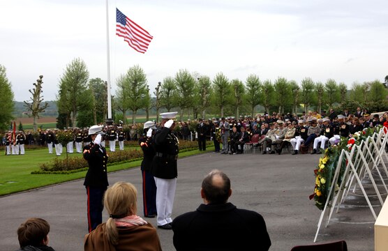 Major General Raymond C. Fox, commanding general of U.S. Marine Corps Forces Africa and II Marine Expeditionary Force, lays a wreathe in tribute and commemoration of the fallen troops for the Memorial Day event at Aisne-Marne American Cemetery, May 26. To celebrate Memorial Day, and to mark the 95th anniversary of the historic Battle of Belleau Wood, U.S. Marines with their French counterparts gathered at Aisne-Marne American Cemetery to commemorate their fallen heroes, May 26. The event was held in the memorial cemetery that lies outside of the historic grounds of Belleau Wood and featured the laying of wreathes, a firing of volleys, the playing of TAPS, raising of the American and French national colors, and a concert by the French military band. The mayor of the village of Bellau along with other military officers and officials representing the U.S. and France were present. Participating units from the U.S. Marines included 5th Marine Regiment, Marine Security Guard Detachment, the Wounded Warrior Regiment and Marine Forces Europe and Africa. French units that participated in the ceremony included the 21st Marine Infantry Regiment and the Musique Principale des Troupes de Marines. 
