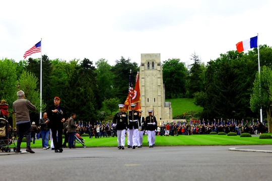 The Marine detail from 5th Marine Regiment marches off of the parade field after a Memorial Day ceremony at Aisne-Marne American Cemetery, May 26. To celebrate Memorial Day, and to mark the 95th anniversary of the historic Battle of Belleau Wood, U.S. Marines with their French counterparts gathered at Aisne-Marne American Cemetery to commemorate their fallen heroes, May 26. The event was held in the memorial cemetery that lies outside of the historic grounds of Belleau Wood and featured the laying of wreathes, a firing of volleys, the playing of TAPS, raising of the American and French national colors, and a concert by the French military band. The mayor of the village of Bellau along with other military officers and officials representing the U.S. and France were present. Participating units from the U.S. Marines included 5th Marine Regiment, Marine Security Guard Detachment, the Wounded Warrior Regiment and Marine Forces Europe and Africa. French units that participated in the ceremony included the 21st Marine Infantry Regiment and the Musique Principale des Troupes de Marines. 

