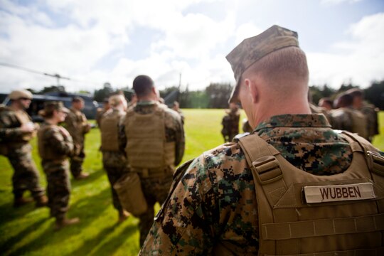 Sgt. Greg Wubben, a civil affairs non-commissioned officer with I Marine Expeditionary Force, 1st Civil Affairs Group, from Ridgefield, Wash., waits for a familiarization brief on New Zealand helicopters during the initial stages of exercise Southern Katipo 2013 aboard Linton Military Camp, New Zealand, Nov. 4. SK13 allows our service members to collaborate with partner countries to achieve mutual security goals, address shared concerns and continue to enhance our interoperability.
