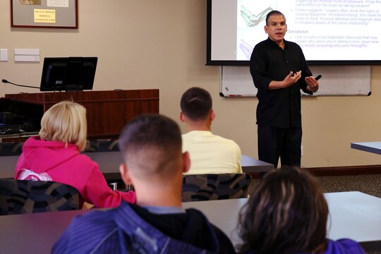 Lt. Cmdr. Frank Munoz, the command chaplain for the Naval Hospital Camp Pendleton, talks to couples during the “P.S., before you say I do” premarital seminar held at the hospital on Oct. 16. The seminar is a collection of classes for engaged or newlywed service members with presentations on various topics of interest to newlyweds such as the art of being together, financial management, divorce, Marine Corps Community Services assistance, domestic violence and family readiness.