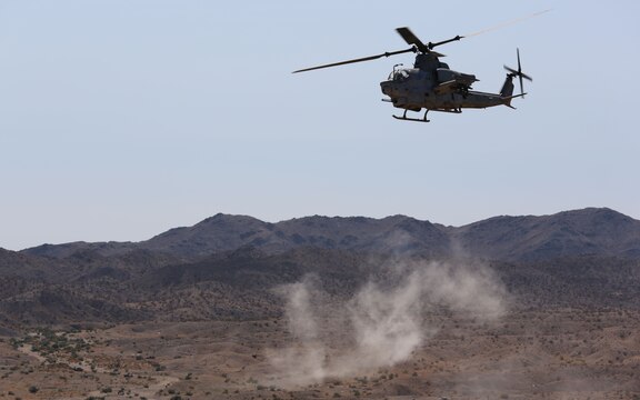An AH-1Z super cobra helicopter circles around to a target for immediate fire drills at a range northwest of Marine Corps Air Station Yuma, Ariz., Aug. 15., in support of a team of joint terminal attack controllers with 3RD Air Naval Gunfire Liaison Company Marine Forces Reserve, based out of the Armed Forces Reserve Center in Bell, Calif. (Photo by Cpl. Uriel Avendano