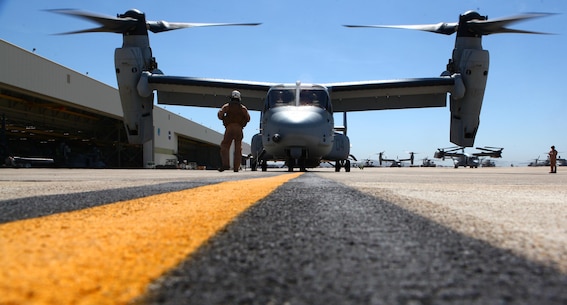 An Osprey with Marine Medium Tiltrotor Squadron 165 runs as pilots perform pre-flight preparations before Maj. Gen. Gregg Sturdevant, 3rd Marine Aircraft Wing assistant wing commander, takes his final flight with the wing aboard Marine Corps Air Station Miramar, Calif., May 14. Sturdevant wanted to take one last flight with 3rd MAW and felt it fitting he fly with his former squadron.