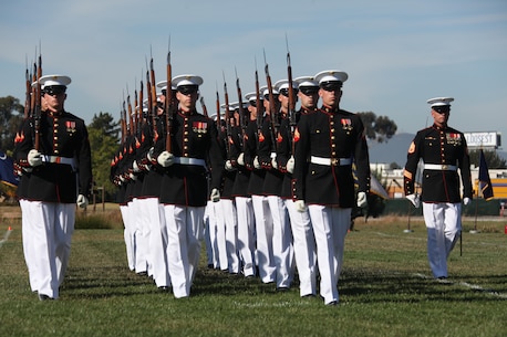 Marines with the Silent Drill Platoon perform during a Battle Colors Ceremony aboard Marine Corps Air Station Miramar, Calif., March 14. With a reputation of perfection throughout the world, the silent drill platoon reminds onlookers of the proud esprit de corps found in Marines serving all around the globe.