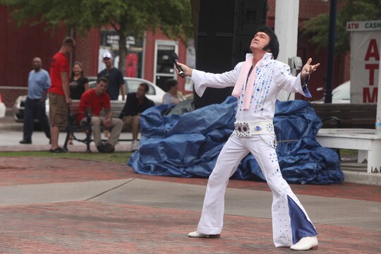 Jay Barnes, local Elvis impersonator, performed at the 11th annual Riverwalk Festival in Jacksonville, N.C., Saturday. The Riverwalk Festival brought families together and gave them an outlet to enjoy their surroundings and time together.