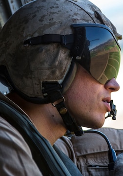 Staff Sgt. James Barnhill, a CH-46E <b>Sea Knight</b> crew chief with Marine - 130910-M-RB277-021