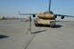 Master Sgt. Bradley Hayes, 386th Expeditionary Logistics Readiness Squadron ramp operations noncommissioned officer in charge, directs an M-1 tank following its offload at an undisclosed location in Southwest Asia, Sept. 26, 2013.  Ramp personnel at the 386th Air Expeditionary Wing on average handle more than 3,000 tons of cargo each month.  Hayes is deployed from the 39th Aerial Port Squadron, an Air Force Reserve unit at Peterson Air Force Base, Colo.  He is a native of Round Rock, Texas.  (U.S. Air Force photo by Master Sgt. Chris Campbell)