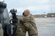 U.S. Air Force Staff Sgt. Jean Vega Martinez, 83rd Expeditionary Rescue Squadron flight engineer, hugs his father U.S. Air Force Senior Master Sgt. Carmelo Vega Martinez, 438th Air Expeditionary Wing/NATO Air Training Command-Afghanistan recruiting adviser, after reenlisting in the U.S. Air Force, March 17, 2014, Bagram Air Field, Afghanistan. Prior to the ceremony, father and son, both Ponce, Puerto Rico natives, hadnt seen each other in two years due to military commitments.  The two are deployed at separate Operation Enduring Freedom bases, 40 miles across the combat zone.  The two are deployed at separate Operation Enduring Freedom bases, 40 miles across the combat zone.  (U.S. Air Force photo by Tech. Sgt. Jason Robertson/Released)