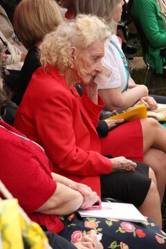 Nell Hannah, mother of a deceased Marine officer, dries her tears during a 6-67 Memorial dedication at The Basic School on April 25, 2014. The memorial was dedicated to the class who suffered 50 casualties and more than 200 wounded Marines. 