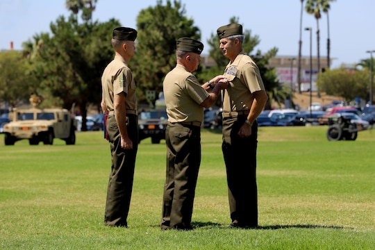 CAMP PENDLETON, Calif. - Brig. Gen John W. Bullard relinquished command of Marine Corps Installations West and Marine Corps Base Camp Pendleton to Brig. Gen. Edward D. Banta during a Change of Command at the 11 Area Parade Field Aug. 1.

Bullard who served as commanding general here since August 2013, acting as both the commanding general for Marine Corps Base Camp Pendleton as well as commanding general for MCI-West, is retiring after 31 years of honorable and faithful military service.

Before taking command of MCI-West, Banta served as the commanding general of 2nd Marine Logistics Group in Camp Lejeune. N.C.
