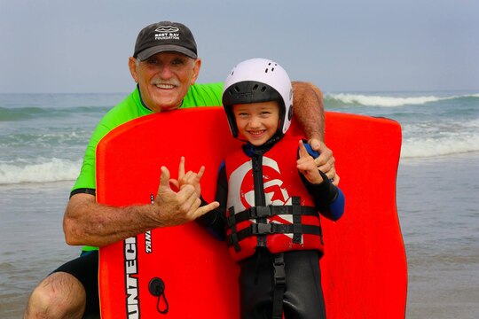 Carlos Gutierrez, an event volunteer, and Tyler, 5, enjoy time in the ocean during the Exceptional Family Member Program beach event at Del Mar Beach, Aug. 2-3. 

The Best Day Foundation Orange County Chapter hosted the event for special needs children that are enrolled in the EFMP. The event provided activities such as surfing, body boarding, kayaking and more. 

“For families like us, we don’t have a lot of opportunities for our kids to experience what the normal family might,” said Jolanda Graham, parent and volunteer EFMP family representative.  

Involved parents such as Graham also appreciate experienced volunteers who make these activities safe and possible.