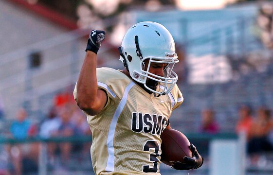 CAMP PENDLETON, Calif. -- The 1st Light Armored Reconnaissance Battalion Highlanders controlled the field and finished victorious, 28 – 8 against the 1st Marine Logistics Group Beast, during the 2nd week of the Commanding Generals Cup Football League, at the Paige Fieldhouse football field, Aug. 19.

