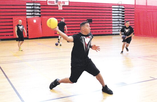 A Marine powers up his throw during Headquarters and Service Battalion’s dodgeball tournament Aug. 14 at Barber Physical Activity Center.