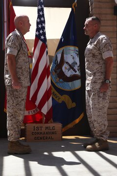 Lieutenant Gen. David H. Berger (left), commanding general, I Marine Expeditionary Force, promotes Brig. Gen. Vincent A. Coglianese (right), commanding general, 1st Marine Logistics Group, to major general aboard Camp Pendleton, Calif., Aug. 19, 2014. Berger said Coglianese's selection to a two-star general position was a direct reflection of his ability to successfully lead in three particularly difficult billets during his time as a brigadier general.