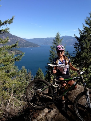 Lt.Cmdr. Melissa Coombes poses with her bike. (courtesy photo)