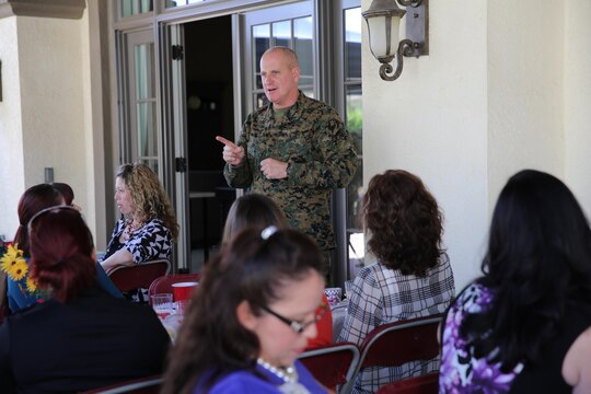 The 3rd MAW commanding general, Maj. Gen. Steven Busby, speaks to spouses of Marines in 3rd Marine Aircraft Wing (MAW) units at a luncheon aboard Marine Corps Air Station Miramar, Calif., Feb. 13. Busby spoke to the spouses and showed his appreciation for their work, as part of the Committed and Engaged Spouse initiative.