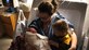 Theresa Ahlgren holds her newborn son and 2-year-old son at Mike O’Callaghan Medical Center Nellis Air Force Base, Nev., Jan. 2, 2014.