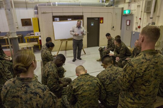 Dave Dagget, construction inspector for U.S. Army Corps of Engineers, instructs a concrete class to combat engineers with Marine Wing Support Squadron 171 aboard Marine Corps Air Station Iwakuni, Japan, Jan. 15, 2014, prior to Exercise Cobra Gold. Dagget has more than 20 years in construction and also taught a rebar class, which consist of bending and welding steel bars. Exercise Cobra Gold is a multinational joint exercise conducted annually in Thailand and is comprised of forces from participating nations including: Thailand, Singapore, Indonesia, Japan, South Korea, Malaysia and the United States. China will also participate in the exercise as an observing nation.
