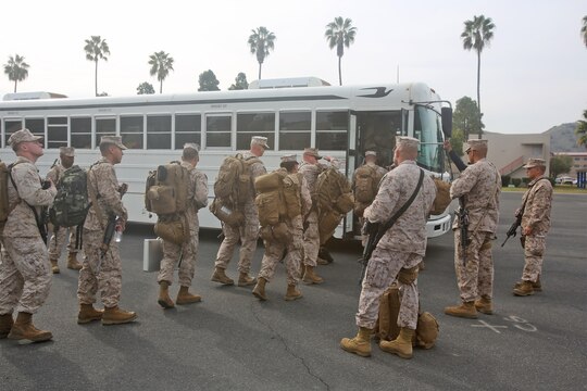 Marines with Combat Logistics Battalion 7, Combat Logistics Regiment 1, 1st Marine Logistics Group, board buses as they start their trip to Afghanistan aboard Camp 
Pendleton, Calif., Jan. 10, 2014. They bid their loved ones farewell as they departed for a six-month-long deployment to Camp Leatherneck alongside corpsmen with 
1st Medical Battalion, 1st MLG. Marines with CLB-7, along with elements of 1st Explosive Ordnance Disposal Company, 1st Medical Battalion, 1st Dental Battalion and 7th Engineer Support Battalion, will support I Marine Expeditionary Force (Fwd) in assuming responsibilities as the logistics battalion for Regional Command (Southwest). 
